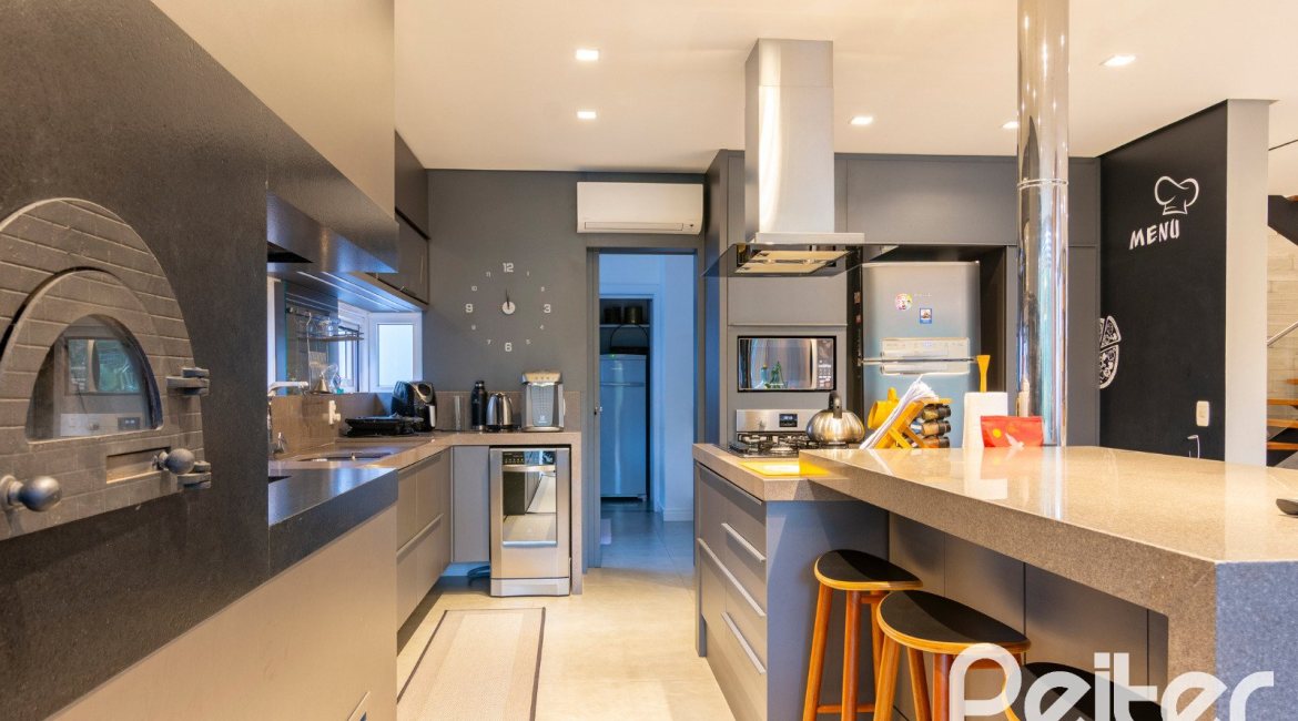 Casa em Condomínio à venda com 308m², 3 dormitórios, 3 suítes, 2 vagas, no bairro Alphaville em PORTO ALEGRE