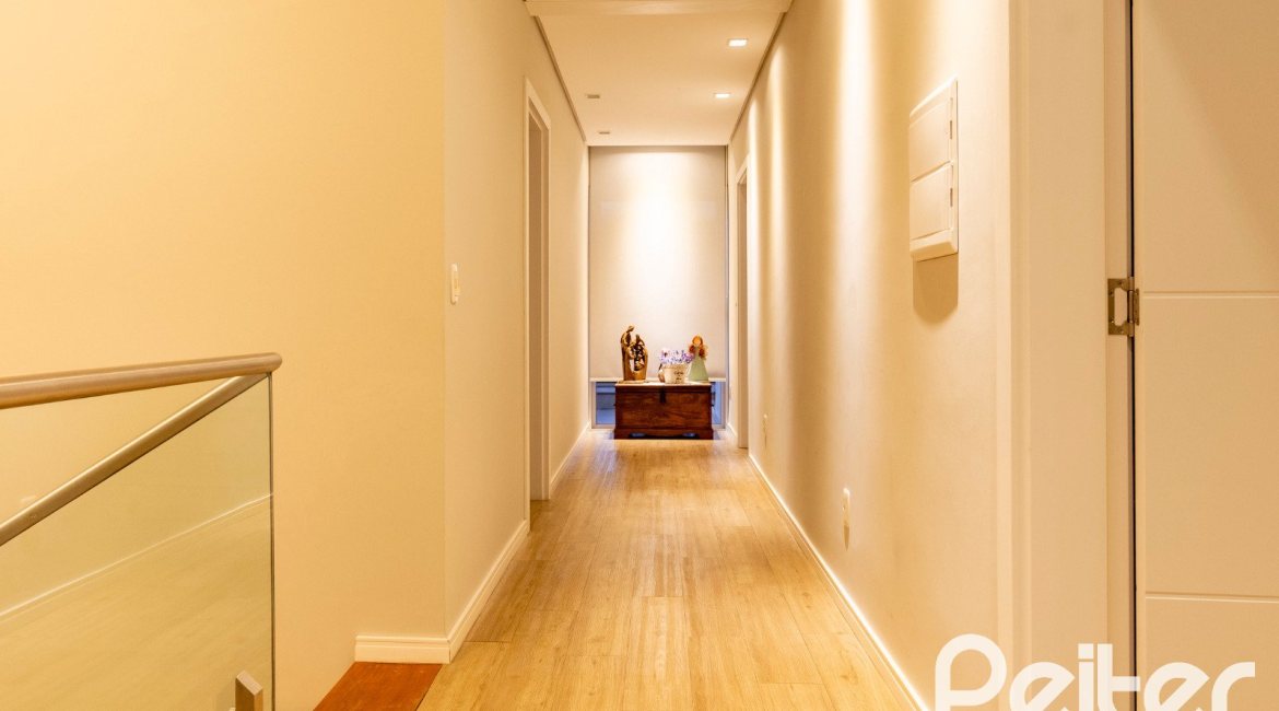 Casa em Condomínio à venda com 308m², 3 dormitórios, 3 suítes, 2 vagas, no bairro Alphaville em PORTO ALEGRE