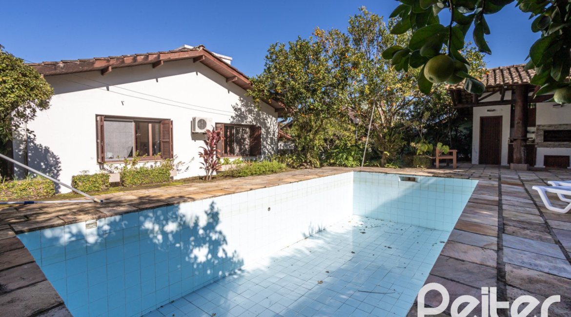 Casa em Condomínio à venda com 280m², 4 dormitórios, 2 suítes, 5 vagas, no bairro Cavalhada em PORTO ALEGRE