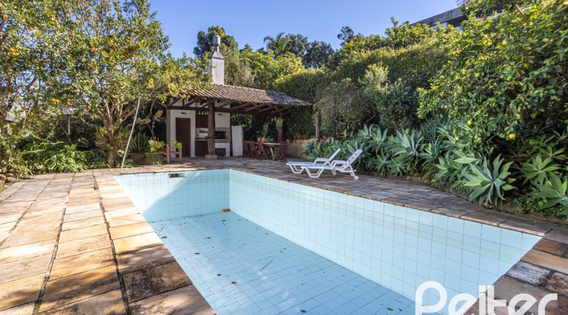 Casa em Condomínio à venda com 280m², 4 dormitórios, 2 suítes, 5 vagas, no bairro Cavalhada em PORTO ALEGRE