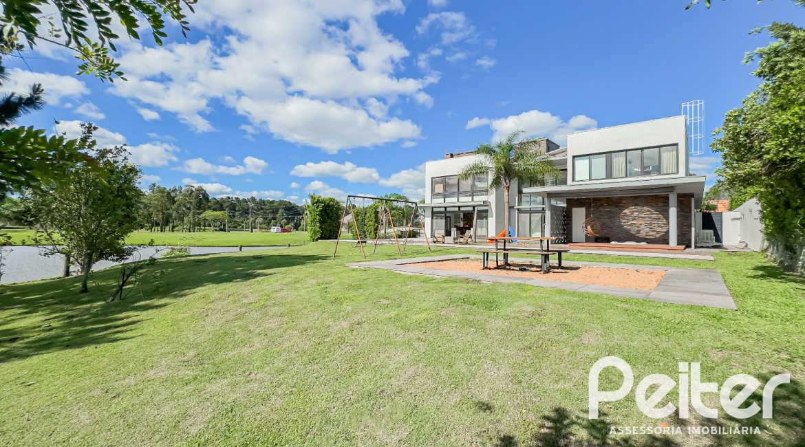 Casa em Condomínio à venda com 385m², 4 dormitórios, 4 suítes, 4 vagas, no bairro Terra Ville em PORTO ALEGRE