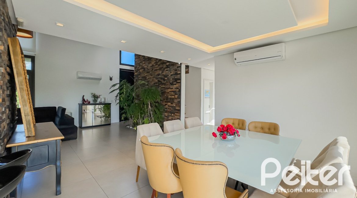 Casa em Condomínio à venda com 385m², 4 dormitórios, 4 suítes, 4 vagas, no bairro Terra Ville em PORTO ALEGRE