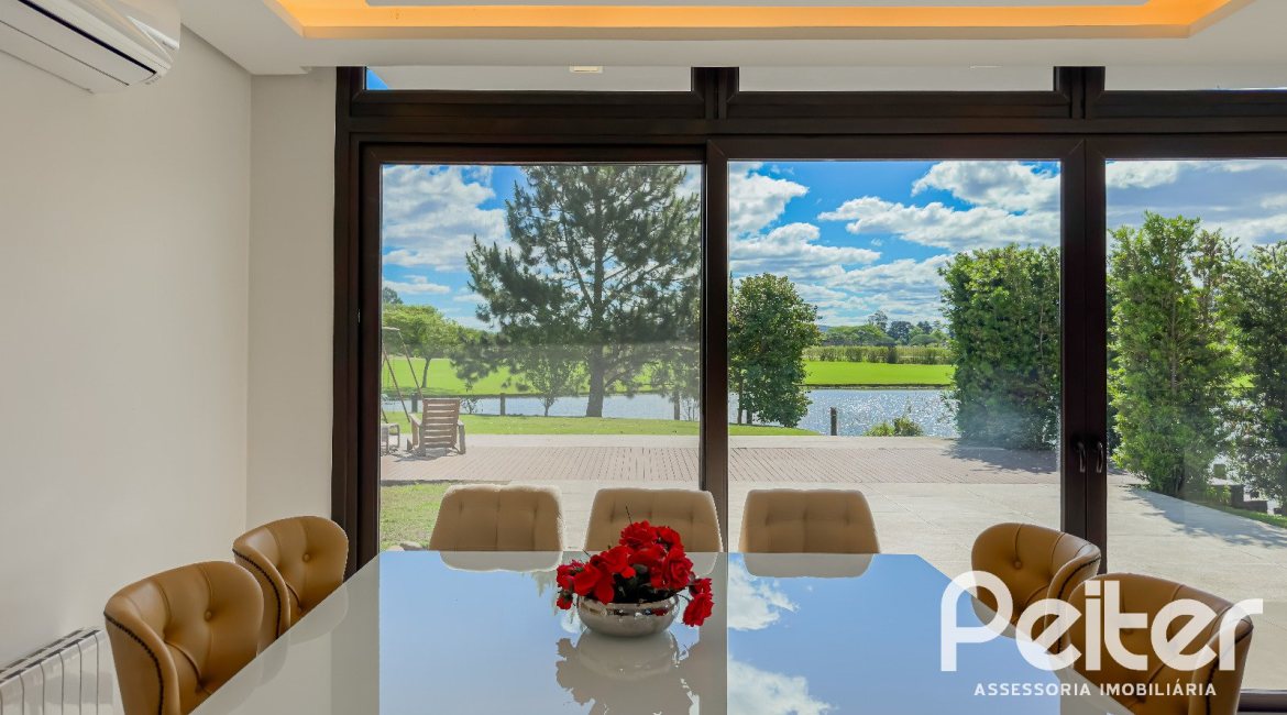 Casa em Condomínio à venda com 385m², 4 dormitórios, 4 suítes, 4 vagas, no bairro Terra Ville em PORTO ALEGRE