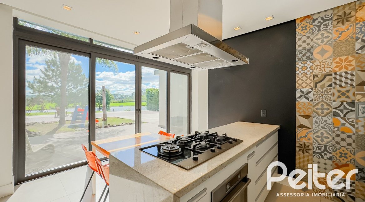 Casa em Condomínio à venda com 385m², 4 dormitórios, 4 suítes, 4 vagas, no bairro Terra Ville em PORTO ALEGRE