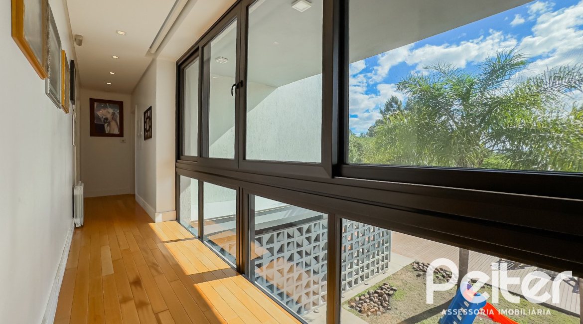 Casa em Condomínio à venda com 385m², 4 dormitórios, 4 suítes, 4 vagas, no bairro Terra Ville em PORTO ALEGRE