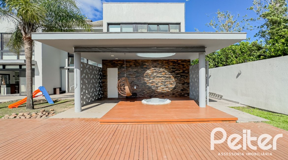 Casa em Condomínio à venda com 385m², 4 dormitórios, 4 suítes, 4 vagas, no bairro Terra Ville em PORTO ALEGRE