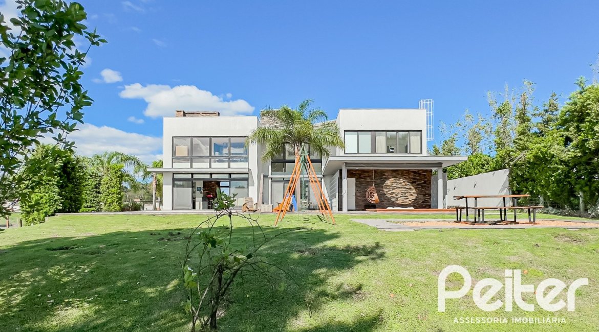 Casa em Condomínio à venda com 385m², 4 dormitórios, 4 suítes, 4 vagas, no bairro Terra Ville em PORTO ALEGRE