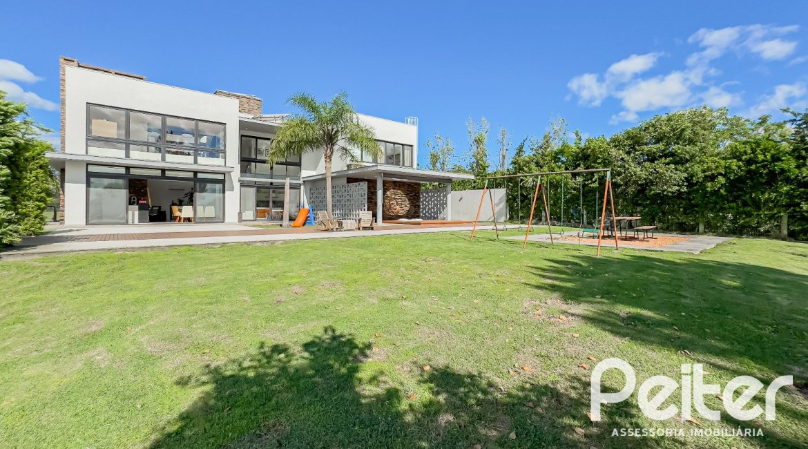Casa em Condomínio à venda com 385m², 4 dormitórios, 4 suítes, 4 vagas, no bairro Terra Ville em PORTO ALEGRE