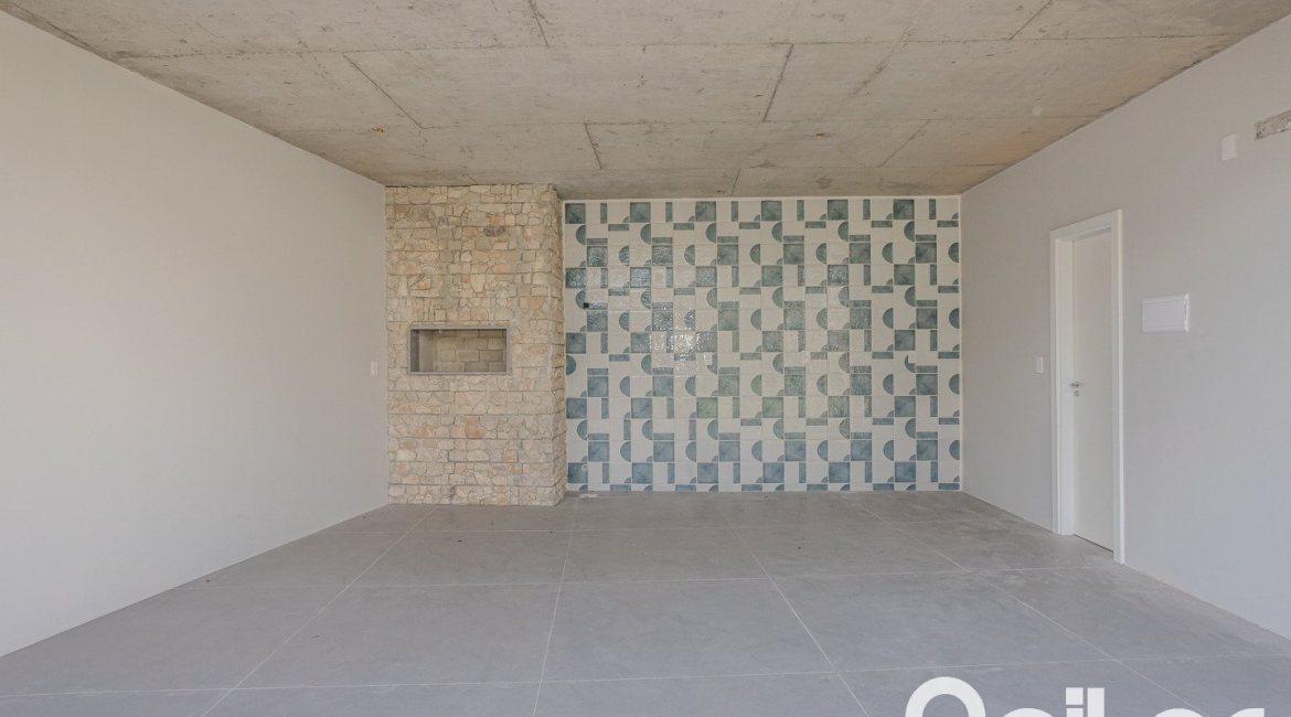 Casa à venda com 230m², 3 dormitórios, 3 suítes, 2 vagas, no bairro Vila Assunção em Porto Alegre