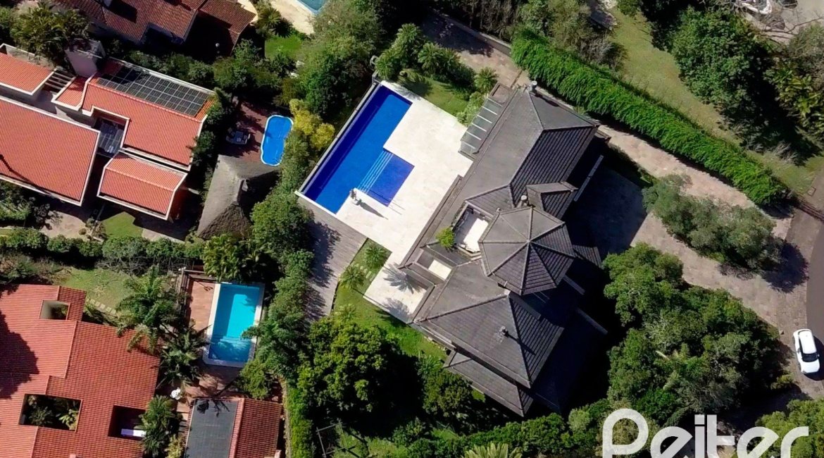 Casa em Condomínio à venda com 1400m², 5 dormitórios, 4 suítes, 10 vagas, no bairro Cavalhada em PORTO ALEGRE