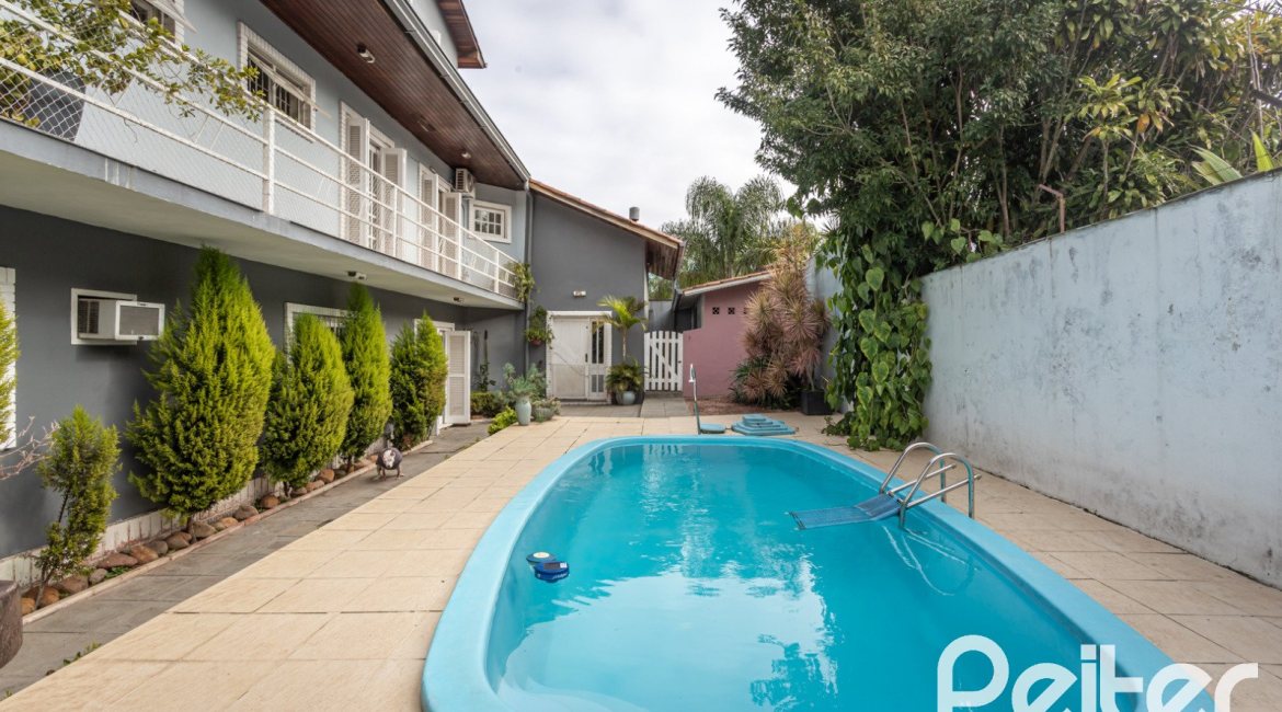 Casa à venda com 334m², 4 dormitórios, 2 suítes, 4 vagas, no bairro Jardim Isabel em Porto Alegre