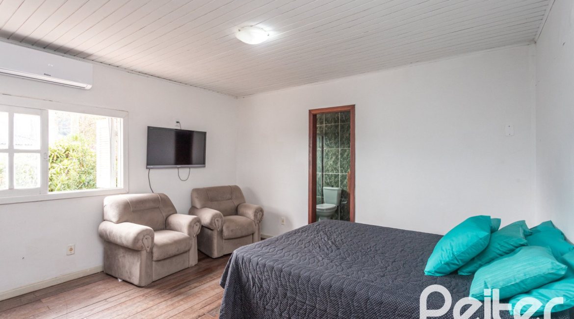 Casa à venda com 334m², 4 dormitórios, 2 suítes, 4 vagas, no bairro Jardim Isabel em Porto Alegre