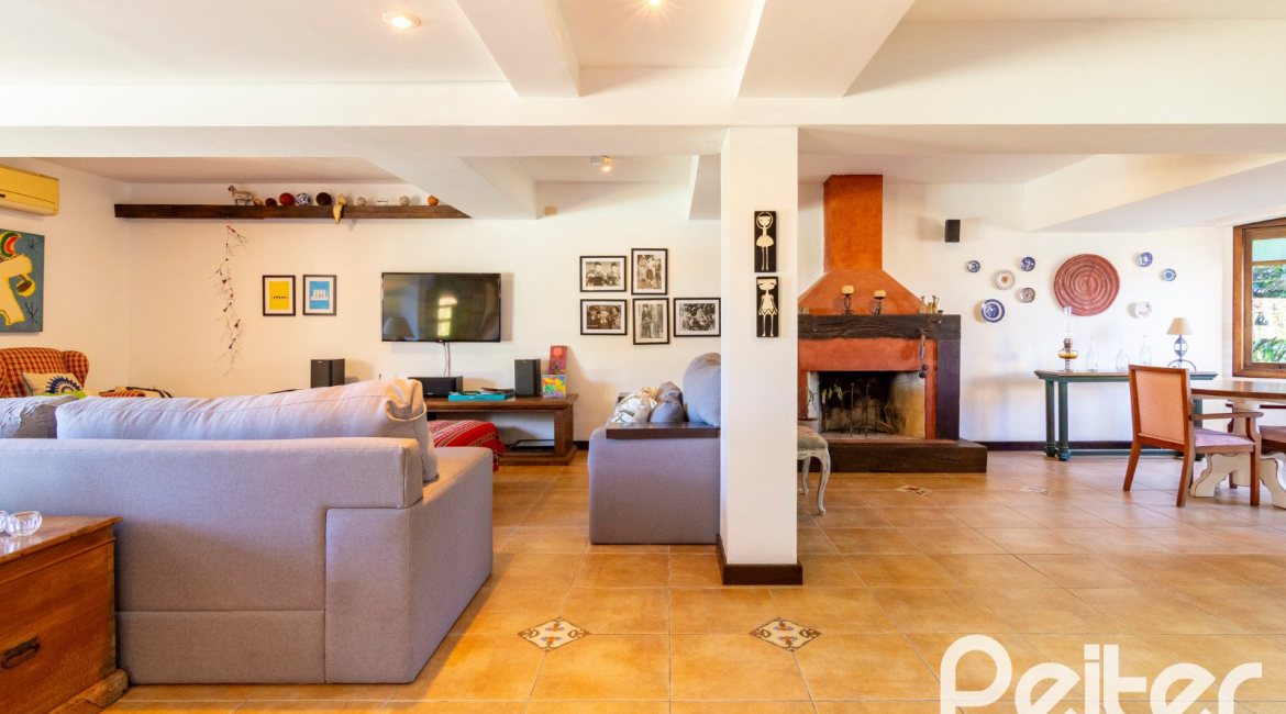 Casa em Condomínio à venda com 315m², 3 dormitórios, 3 suítes, 4 vagas, no bairro Cavalhada em PORTO ALEGRE