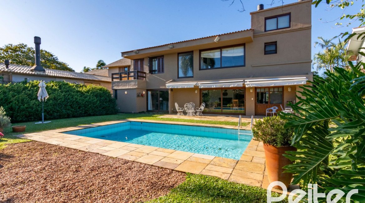 Casa em Condomínio à venda com 315m², 3 dormitórios, 3 suítes, 4 vagas, no bairro Cavalhada em PORTO ALEGRE