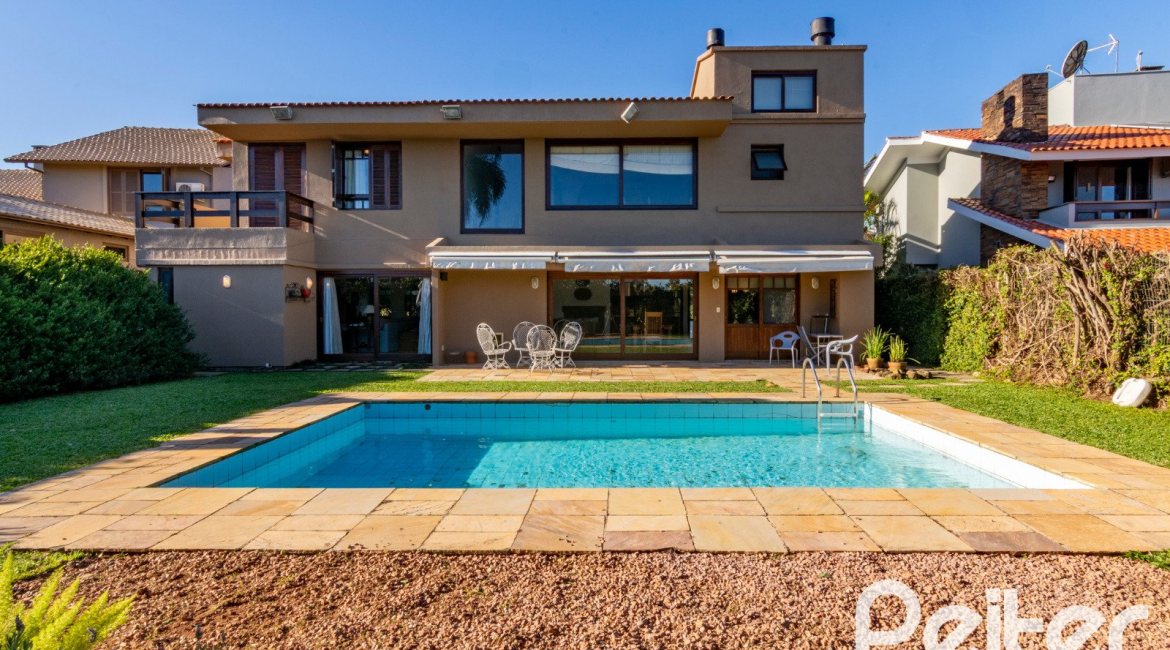 Casa em Condomínio à venda com 315m², 3 dormitórios, 3 suítes, 4 vagas, no bairro Cavalhada em PORTO ALEGRE