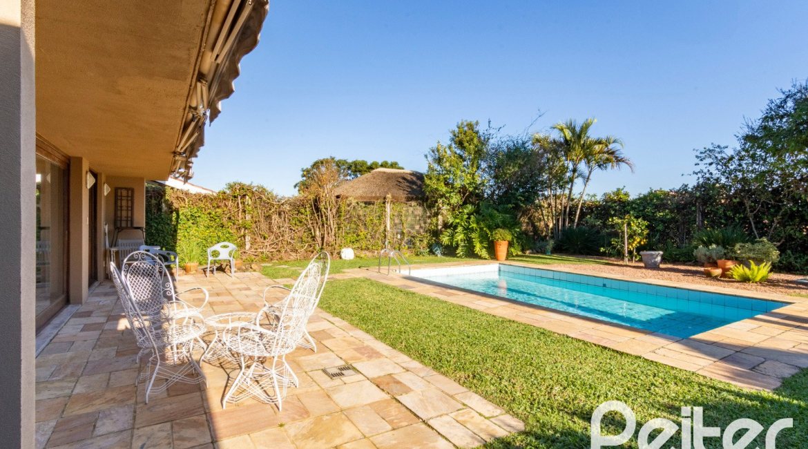 Casa em Condomínio à venda com 315m², 3 dormitórios, 3 suítes, 4 vagas, no bairro Cavalhada em PORTO ALEGRE