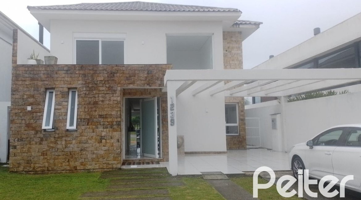 Casa em Condomínio à venda com 349m², 5 dormitórios, 5 suítes, 4 vagas, no bairro Terra Ville em PORTO ALEGRE