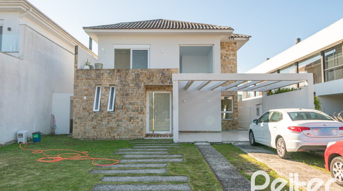 Casa em Condomínio à venda com 349m², 5 dormitórios, 5 suítes, 4 vagas, no bairro Terra Ville em PORTO ALEGRE