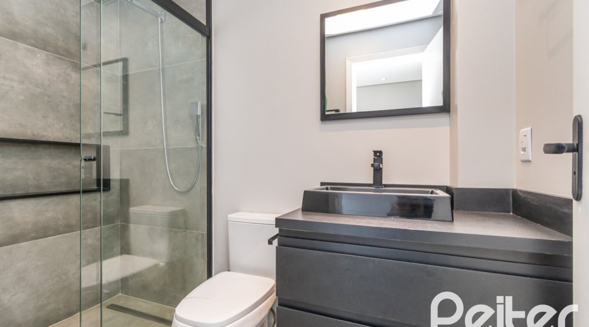 Casa em Condomínio à venda com 248m², 3 dormitórios, 2 suítes, 2 vagas, no bairro Vila Nova em Porto Alegre