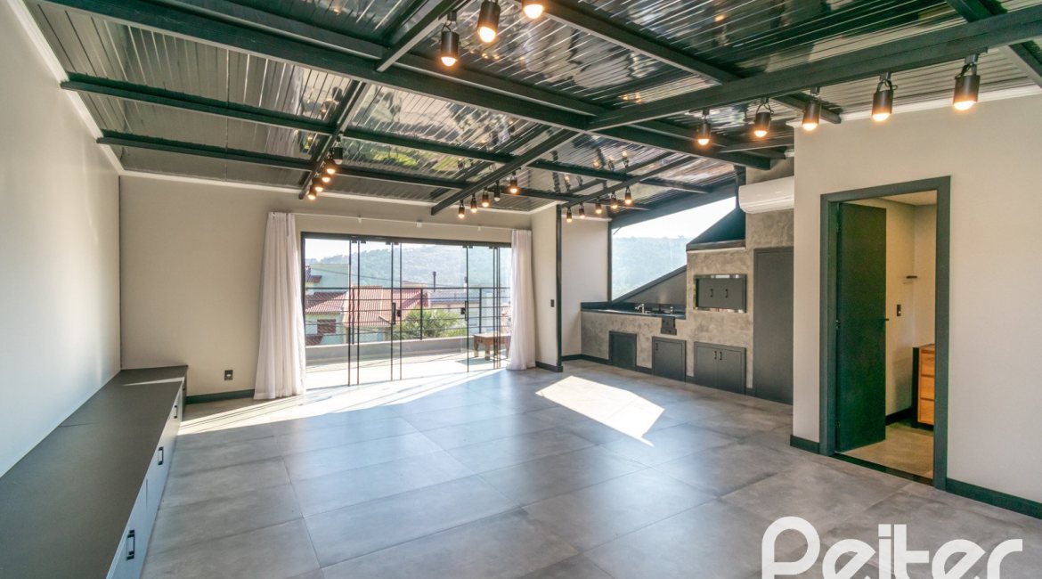 Casa em Condomínio à venda com 248m², 3 dormitórios, 2 suítes, 2 vagas, no bairro Vila Nova em Porto Alegre