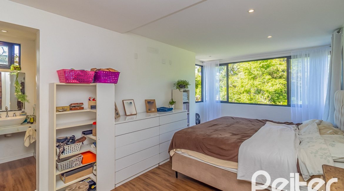 Casa em Condomínio à venda com 395m², 4 dormitórios, 4 suítes, 4 vagas, no bairro Alphaville em PORTO ALEGRE