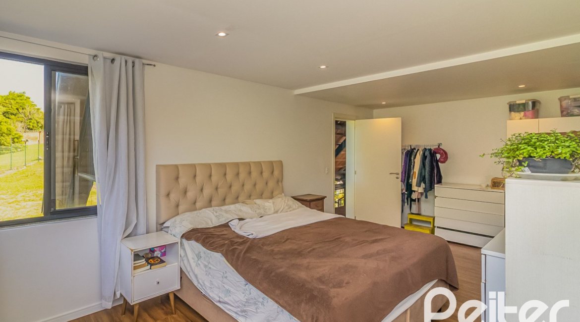 Casa em Condomínio à venda com 395m², 4 dormitórios, 4 suítes, 4 vagas, no bairro Alphaville em PORTO ALEGRE