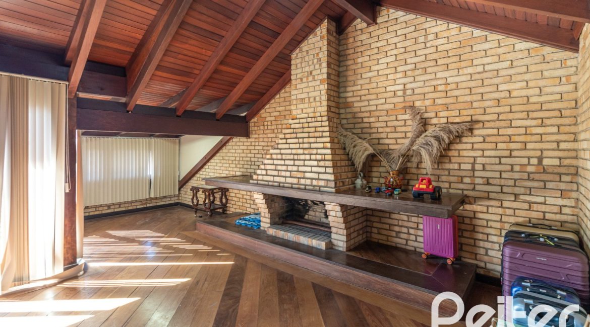 Casa em Condomínio à venda com 421m², 3 dormitórios, 3 suítes, 4 vagas, no bairro Tristeza em Porto Alegre