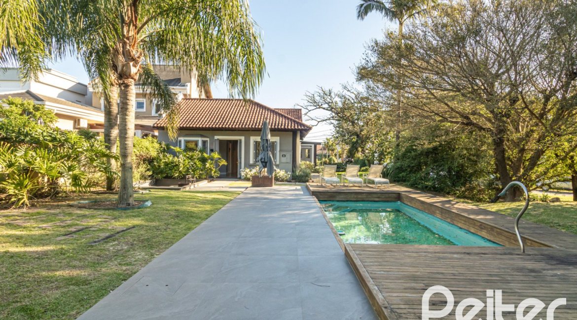 Casa em Condomínio à venda com 196m², 3 dormitórios, 1 suíte, 4 vagas, no bairro Terra Ville em PORTO ALEGRE