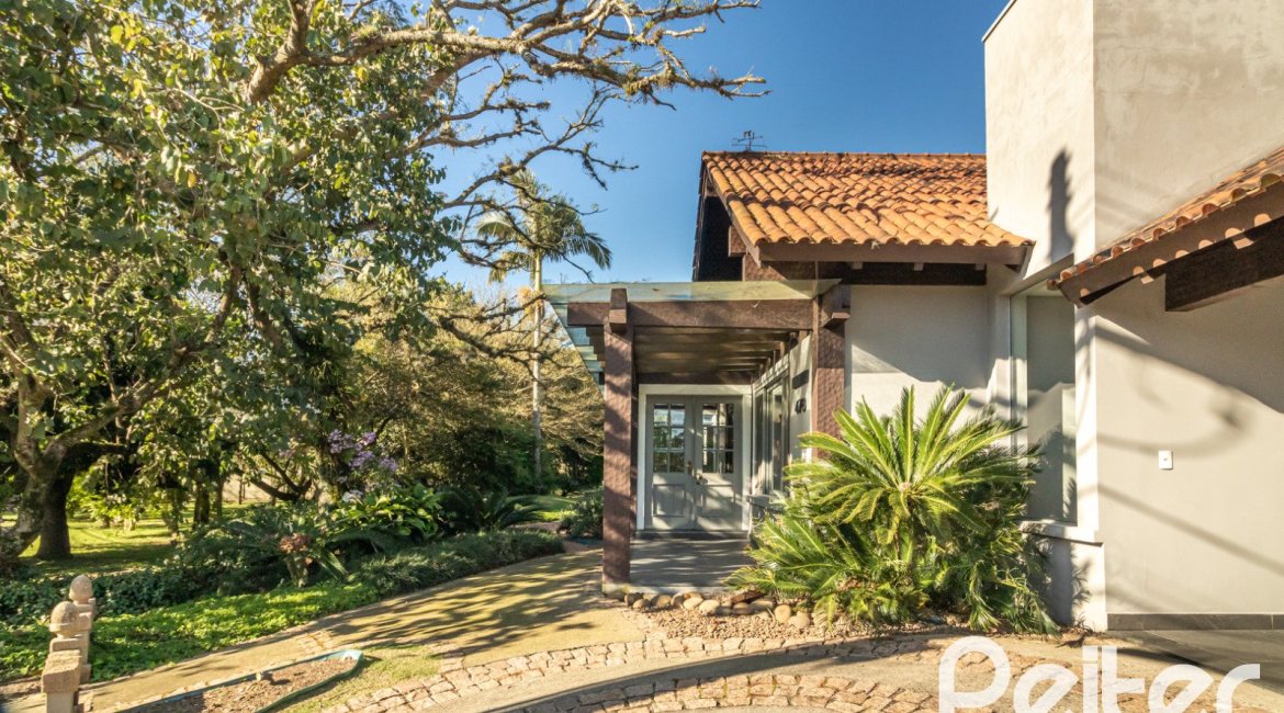 Casa em Condomínio à venda com 196m², 3 dormitórios, 1 suíte, 4 vagas, no bairro Terra Ville em PORTO ALEGRE