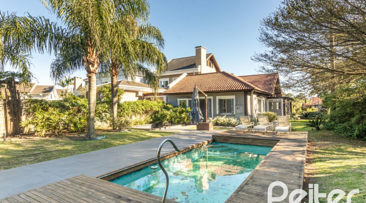 Casa em Condomínio à venda com 196m², 3 dormitórios, 1 suíte, 4 vagas, no bairro Terra Ville em PORTO ALEGRE