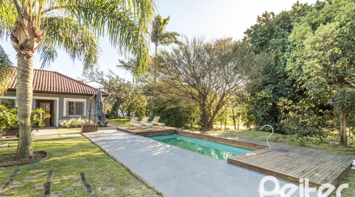 Casa em Condomínio à venda com 196m², 3 dormitórios, 1 suíte, 4 vagas, no bairro Terra Ville em PORTO ALEGRE