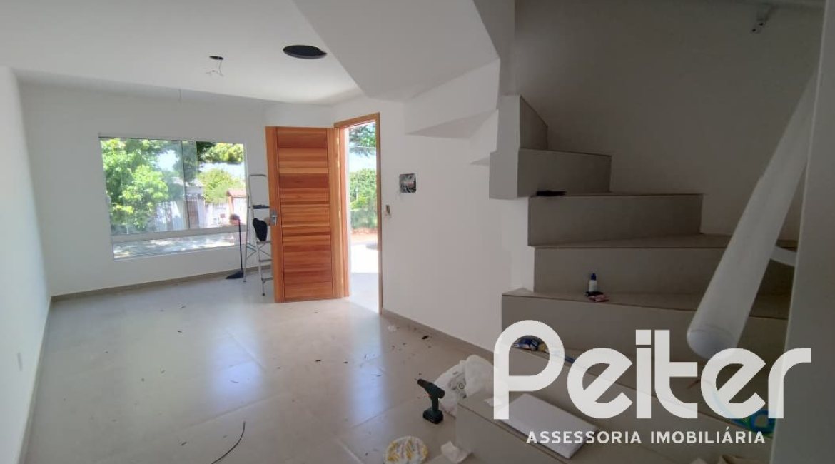 Casa à venda com 74m², 2 dormitórios, 1 suíte, 2 vagas, no bairro Nonoai em Porto Alegre