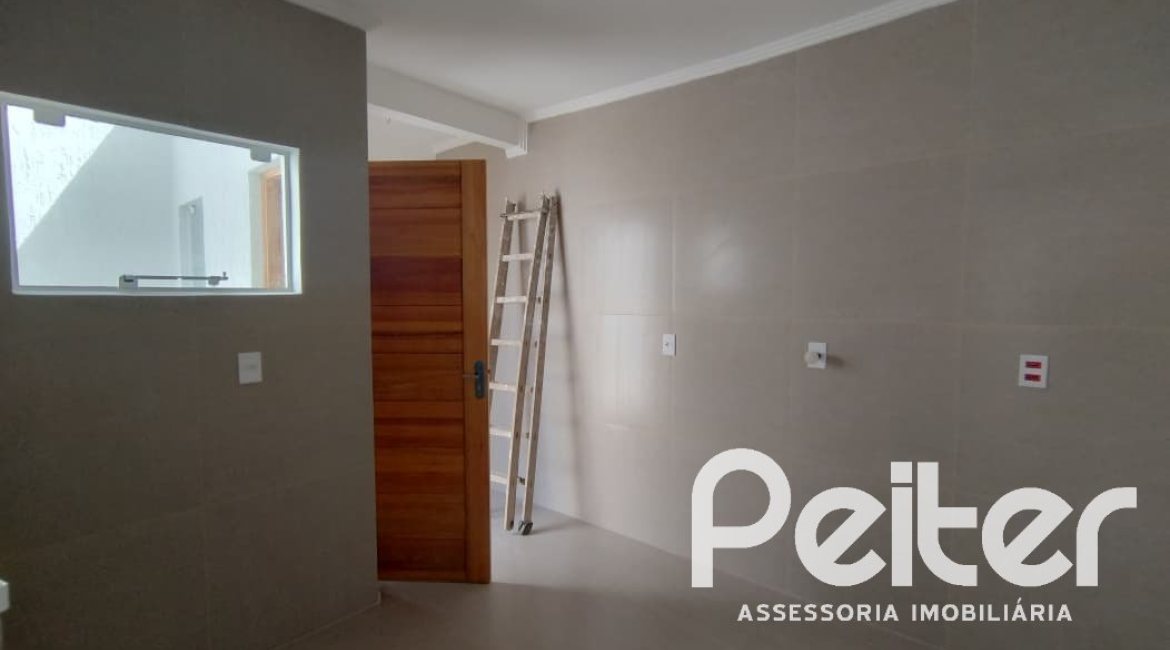 Casa à venda com 74m², 2 dormitórios, 1 suíte, 2 vagas, no bairro Nonoai em Porto Alegre