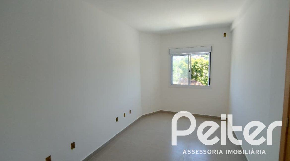 Casa à venda com 74m², 2 dormitórios, 1 suíte, 2 vagas, no bairro Nonoai em Porto Alegre