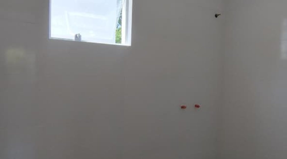 Casa à venda com 74m², 2 dormitórios, 1 suíte, 2 vagas, no bairro Nonoai em Porto Alegre