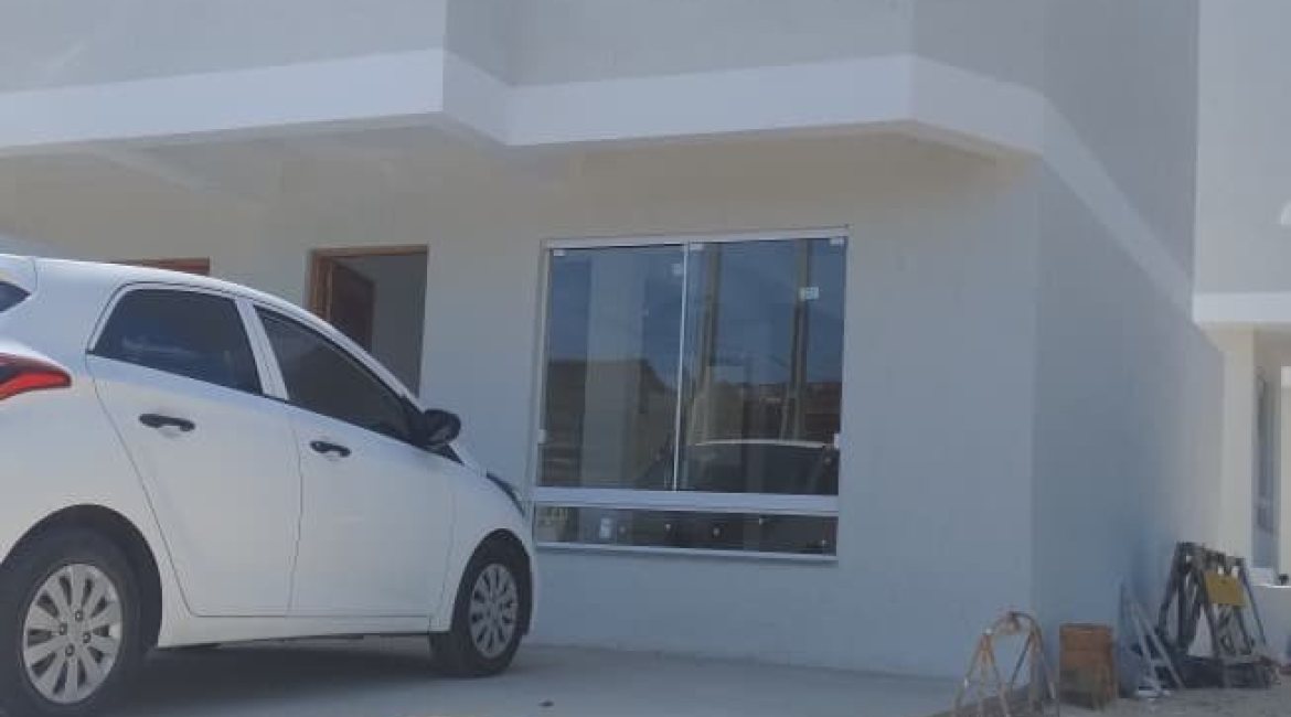 Casa à venda com 74m², 2 dormitórios, 1 suíte, 2 vagas, no bairro Nonoai em Porto Alegre