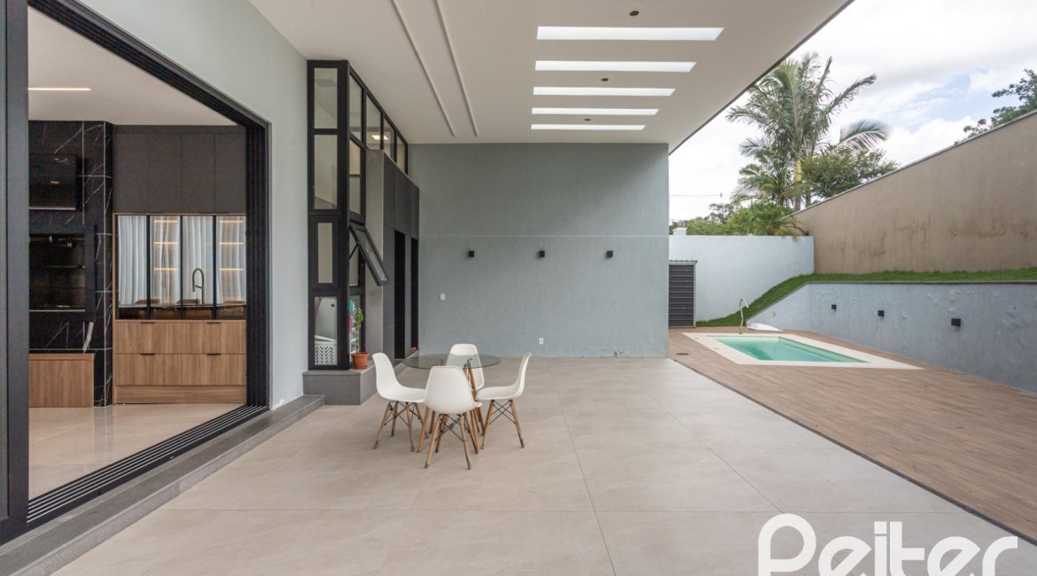 Casa em Condomínio à venda com 303m², 4 dormitórios, 4 suítes, 4 vagas, no bairro Alphaville em PORTO ALEGRE