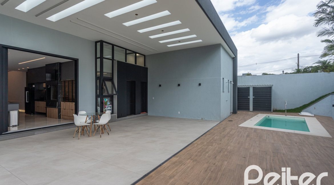 Casa em Condomínio à venda com 303m², 4 dormitórios, 4 suítes, 4 vagas, no bairro Alphaville em PORTO ALEGRE