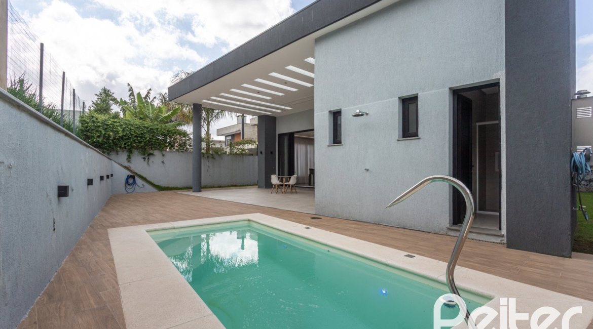 Casa em Condomínio à venda com 303m², 4 dormitórios, 4 suítes, 4 vagas, no bairro Alphaville em PORTO ALEGRE