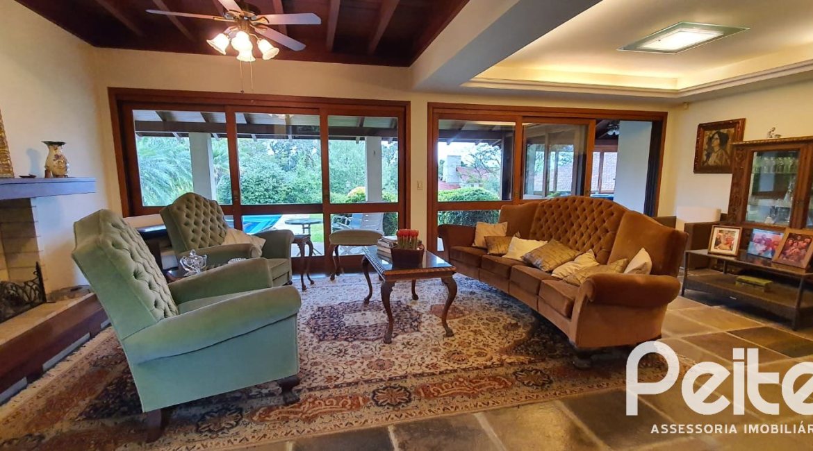 Casa em Condomínio à venda com 299m², 3 dormitórios, 1 suíte, 4 vagas, no bairro Cavalhada em PORTO ALEGRE