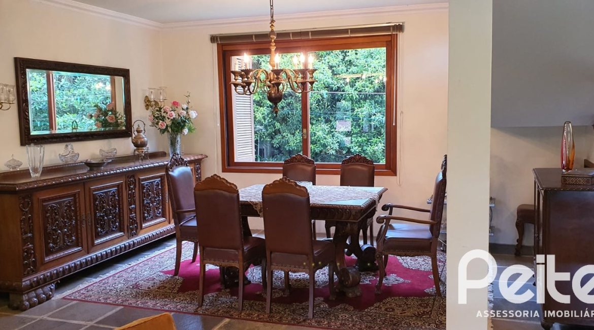 Casa em Condomínio à venda com 299m², 3 dormitórios, 1 suíte, 4 vagas, no bairro Cavalhada em PORTO ALEGRE