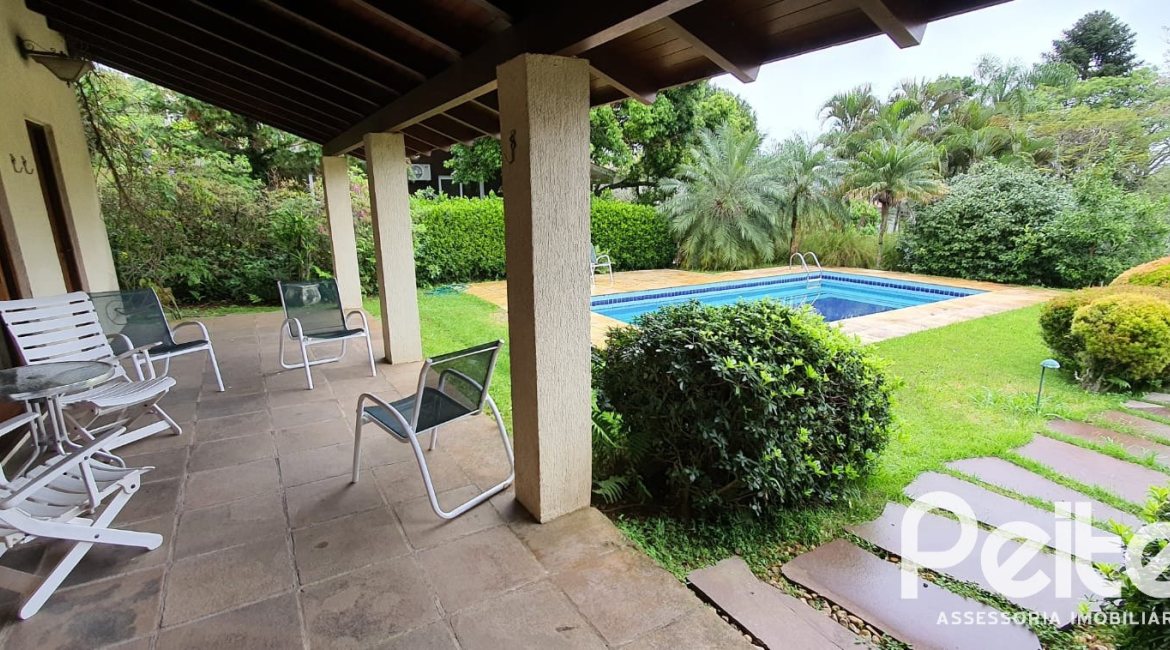 Casa em Condomínio à venda com 299m², 3 dormitórios, 1 suíte, 4 vagas, no bairro Cavalhada em PORTO ALEGRE