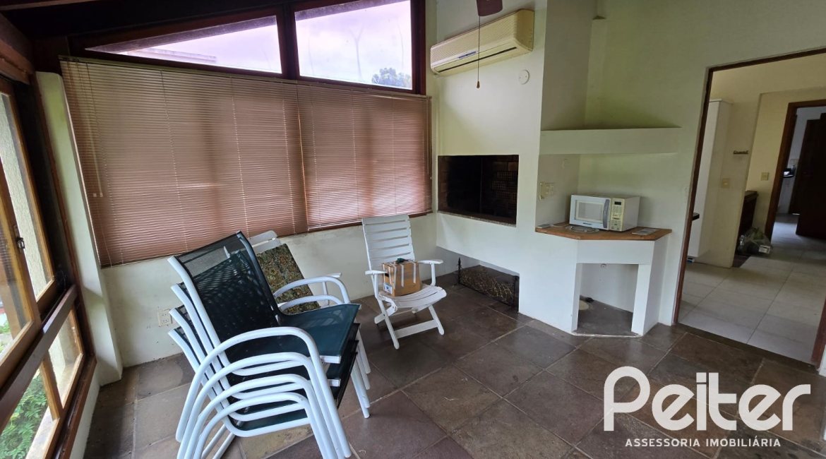 Casa em Condomínio à venda com 299m², 3 dormitórios, 1 suíte, 4 vagas, no bairro Cavalhada em PORTO ALEGRE