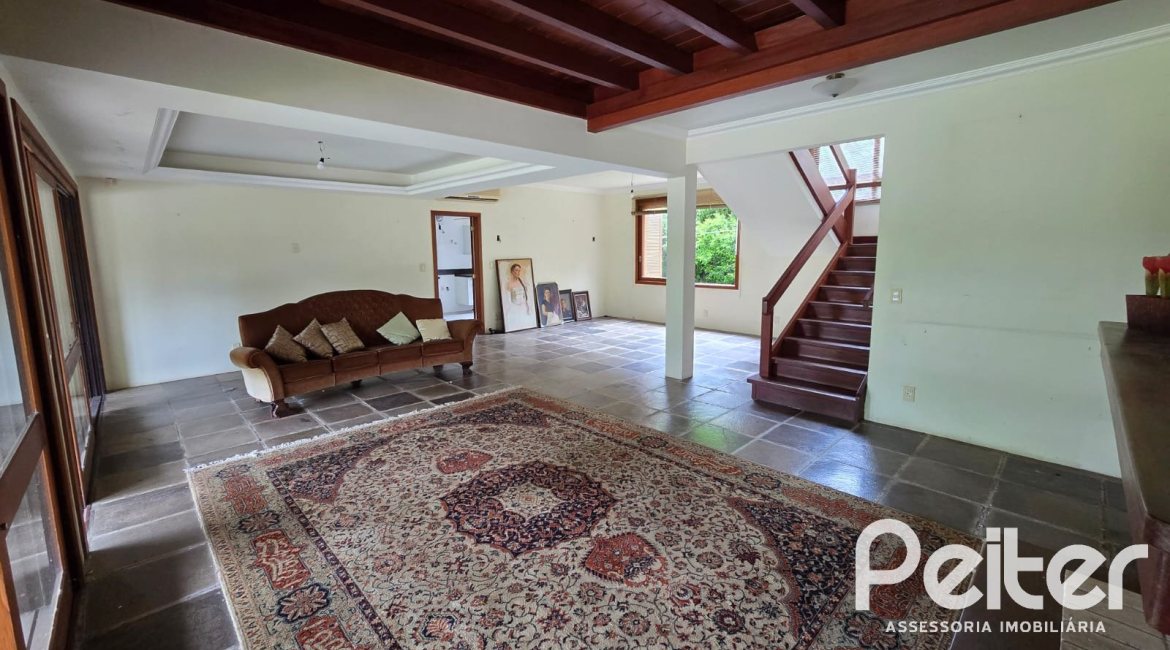 Casa em Condomínio à venda com 299m², 3 dormitórios, 1 suíte, 4 vagas, no bairro Cavalhada em PORTO ALEGRE