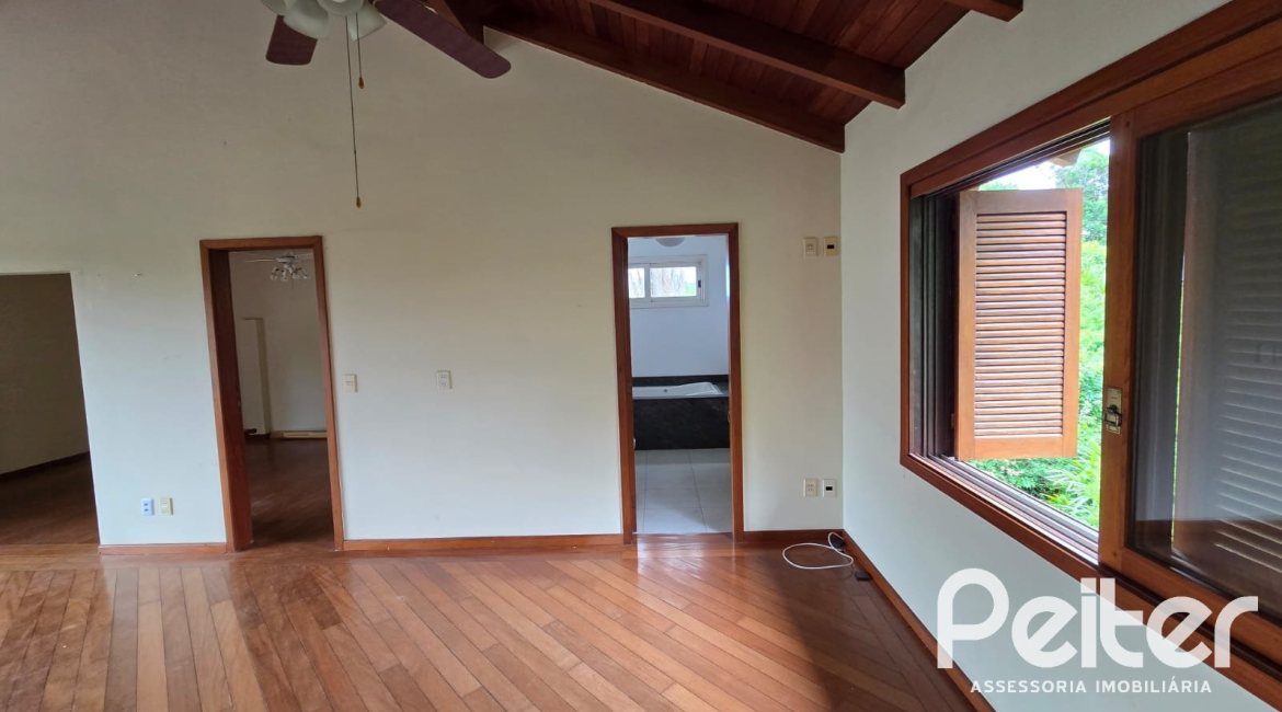 Casa em Condomínio à venda com 299m², 3 dormitórios, 1 suíte, 4 vagas, no bairro Cavalhada em PORTO ALEGRE