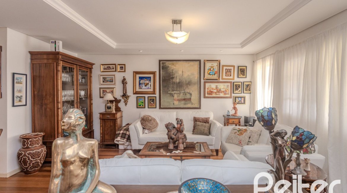 Casa em Condomínio à venda com 259m², 3 dormitórios, 1 suíte, 3 vagas, no bairro Vila Nova em Porto Alegre