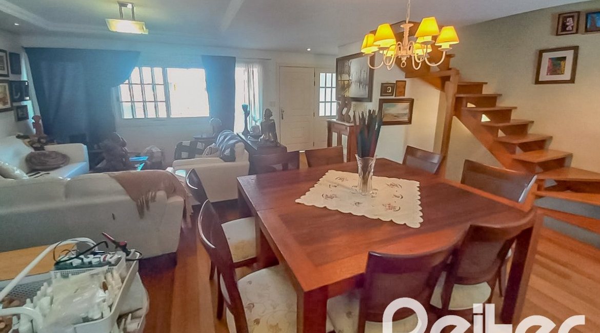 Casa em Condomínio à venda com 259m², 3 dormitórios, 1 suíte, 3 vagas, no bairro Vila Nova em Porto Alegre