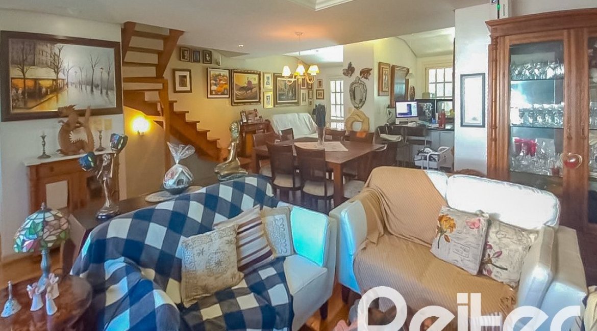 Casa em Condomínio à venda com 259m², 3 dormitórios, 1 suíte, 3 vagas, no bairro Vila Nova em Porto Alegre