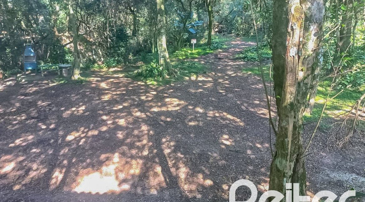 Casa em Condomínio à venda com 259m², 3 dormitórios, 1 suíte, 3 vagas, no bairro Vila Nova em Porto Alegre