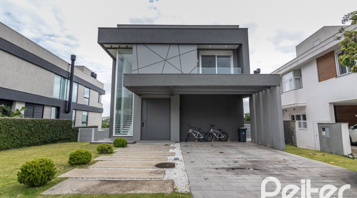 Casa em Condomínio à venda com 309m², 3 dormitórios, 2 suítes, 4 vagas, no bairro Alphaville em PORTO ALEGRE